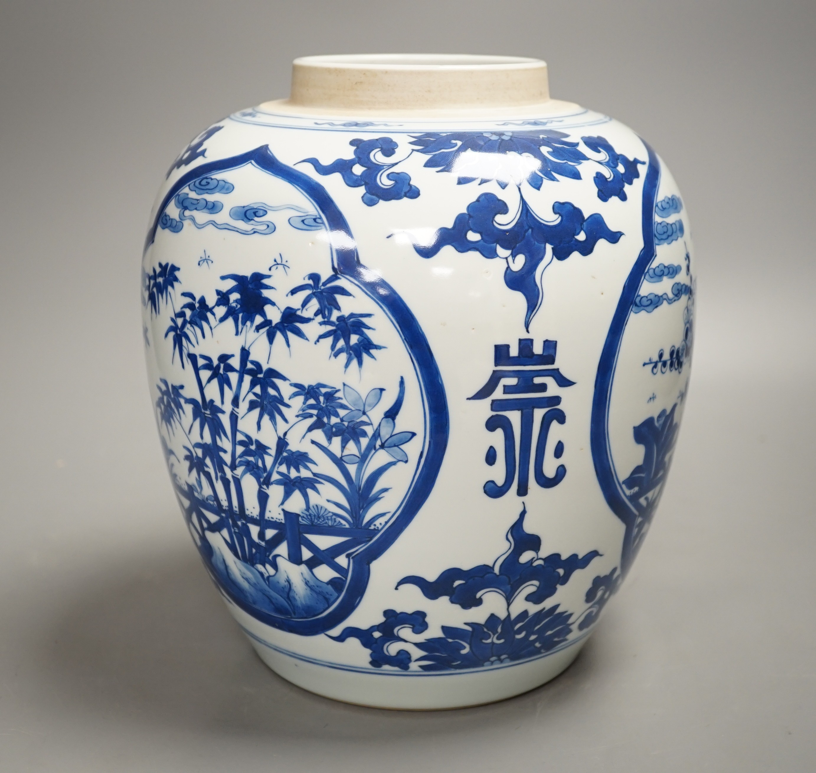 A Chinese blue and white jar, lacking cover 23cm